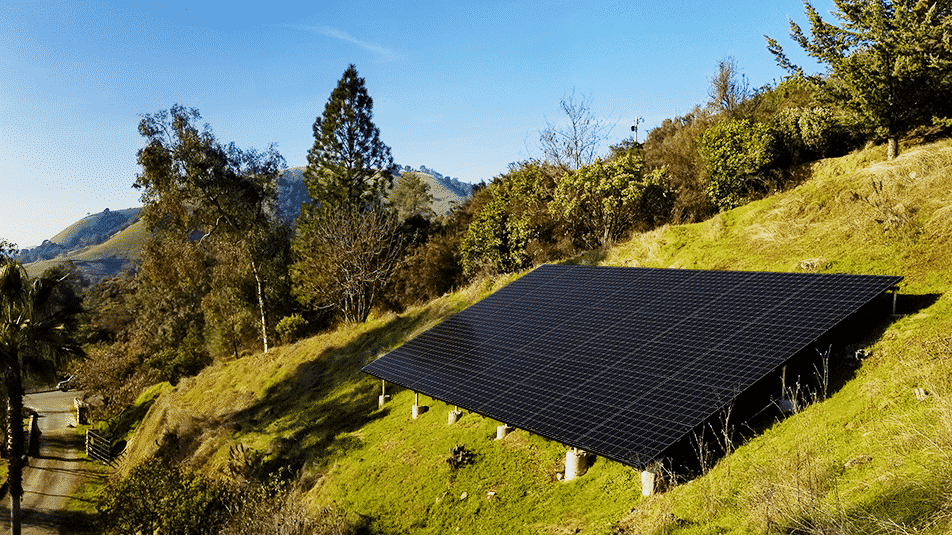 ground solar array on a hillside